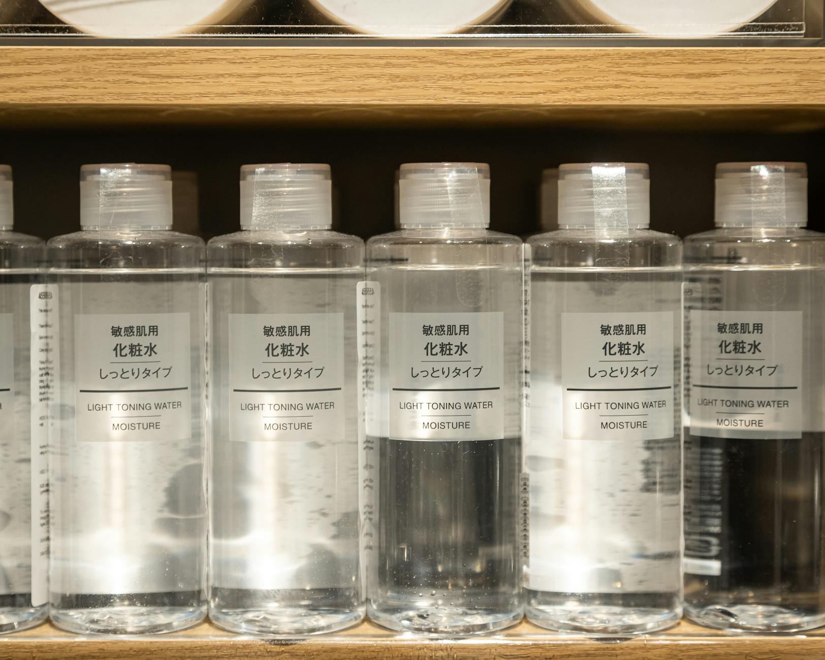 Japanese skincare moisturizer products on a clean white surface